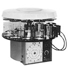 Rotary for automatic fixing/embedding device (1957). 